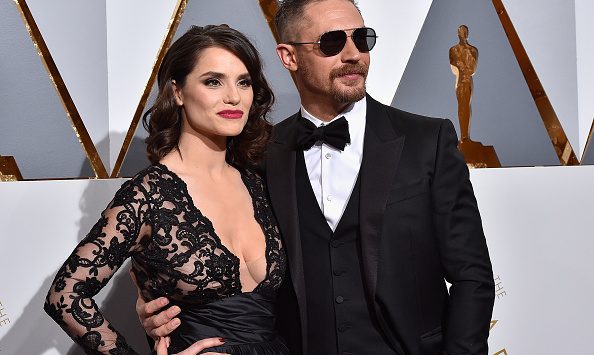 HOLLYWOOD, CA - FEBRUARY 28: Actors Tom Hardy (R) and Charlotte Riley attend the 88th Annual Academy Awards at Hollywood & Highland Center on February 28, 2016 in Hollywood, California. (Photo by Kevork Djansezian/Getty Images)
