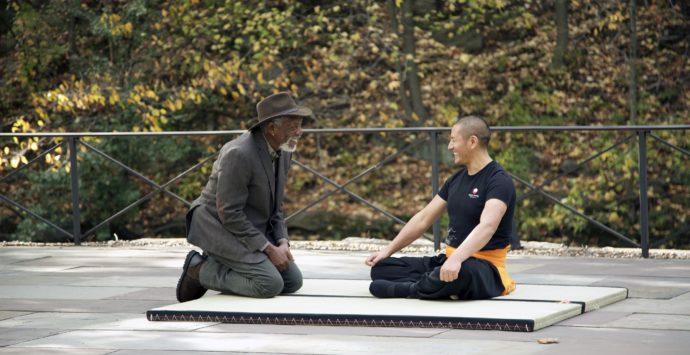 NEW YORK CITY, NY - Morgan Freeman interviews Rinpoche Tulku Lobsang, Tibetan Buddhist Tantryana Master, after his brief warm up in the back patio of Minus 5 Icebar. (Photo Credit: National Geographic/Reza Riazi)