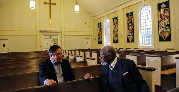 BETHESDA, MD - Former North Korean prisoner and Christian Minister Kenneth Bae shares his experience with Morgan Freeman inside the Concord Saint Andrews United Methodist Church. (Photo Credit: National Geographic/David Kraemer)