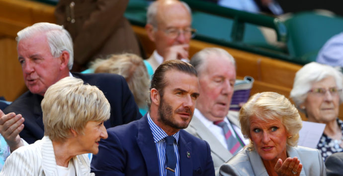 LONDON, ENGLAND - JULY 07: Gill Brook in discussion with David Beckham and Sandra Beckham in the centre court royal box on day five of the Wimbledon Lawn Tennis Championships at the All England Lawn Tennis and Croquet Club on July 7, 2017 in London, England. (Photo by Michael Steele/Getty Images)