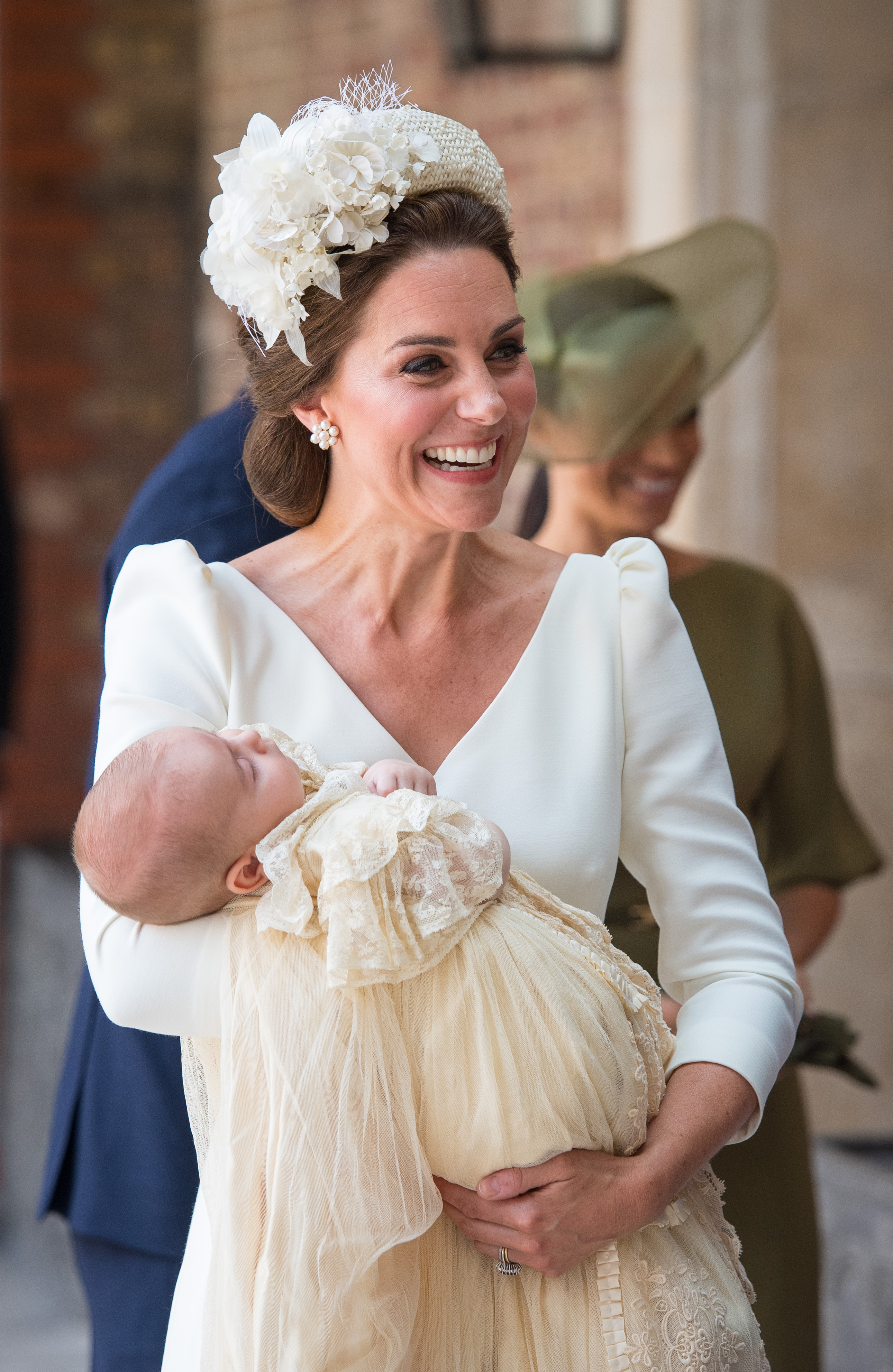 LONDON, ENGLAND - JULY 09: Catherine, Duchess of Cambridge carries Prince Louis as they arrive for his christening service at St James's Palace on July 09, 2018 in London, England. (Photo by Dominic Lipinski - WPA Pool/Getty Images)