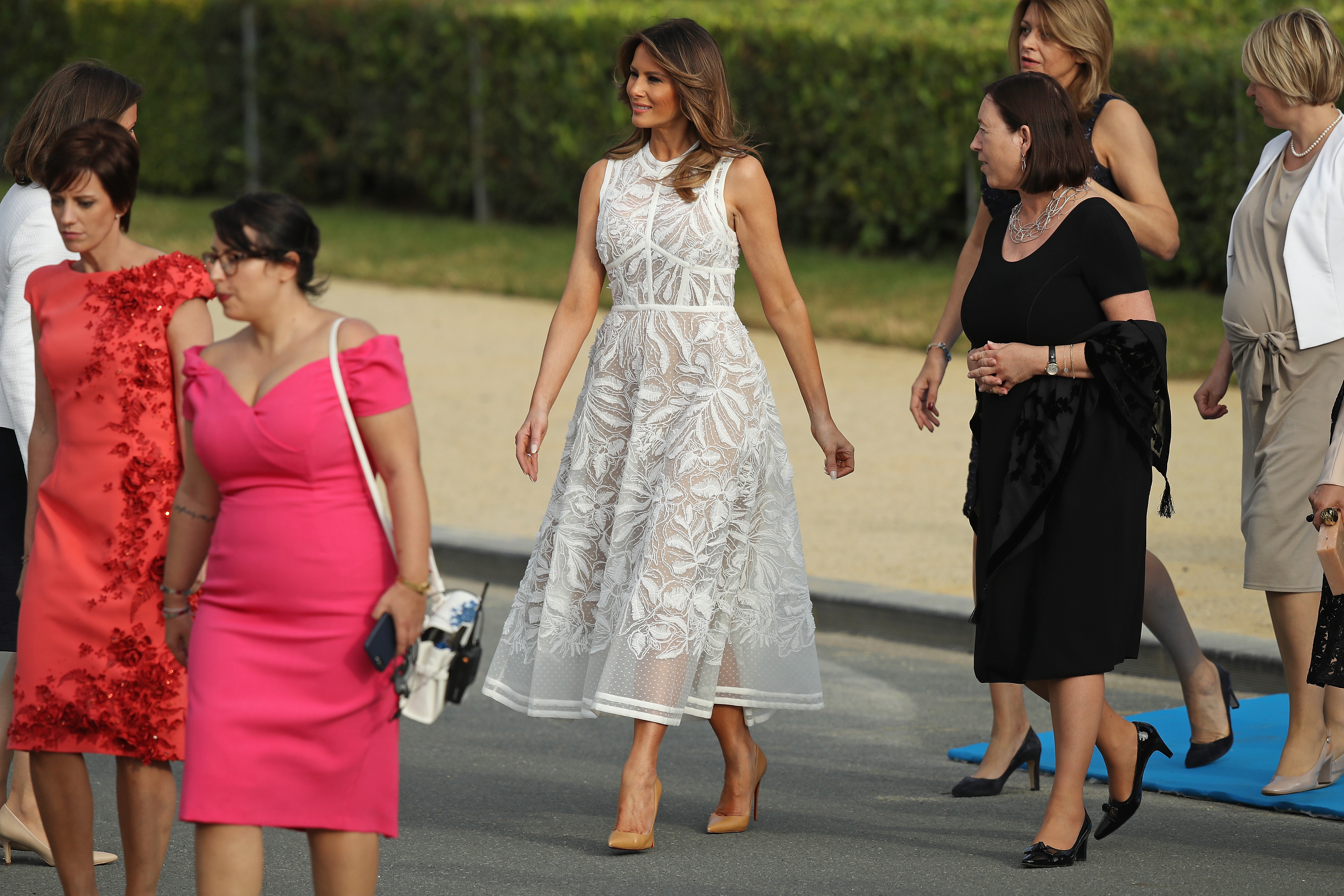 BRUSSELS, BELGIUM - JULY 11: U.S. First Lady Melania Trump (C) and other spouses of heads of state and governments attend the evening reception and dinner at the 2018 NATO Summit on July 11, 2018 in Brussels, Belgium. Leaders from NATO member and partner states are meeting for a two-day summit, which is being overshadowed by strong demands by U.S. President Trump for most NATO member countries to spend more on defense. (Photo by Sean Gallup/Getty Images)