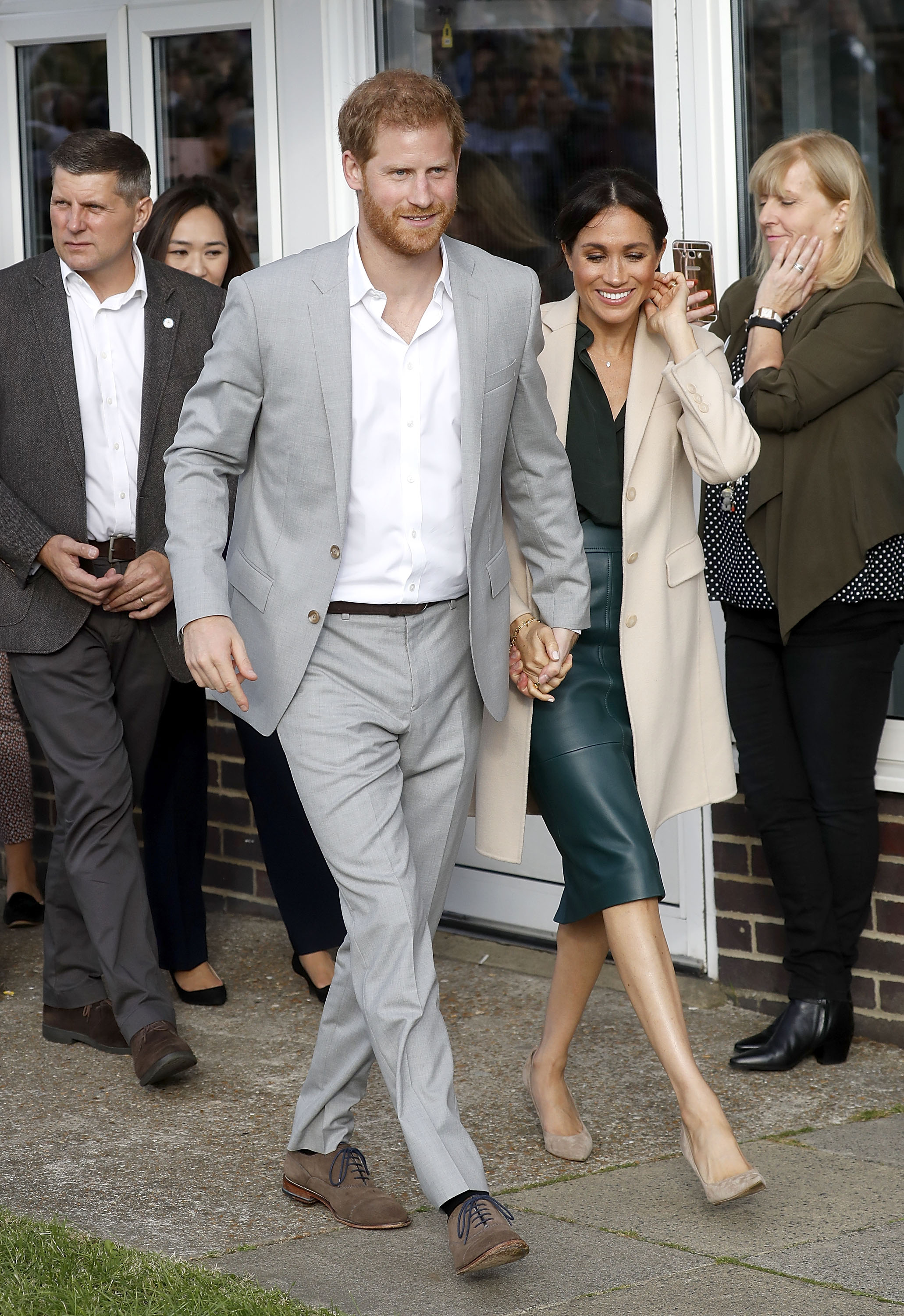PEACEHAVEN, UNITED KINGDOM - OCTOBER 03: Meghan, Duchess of Sussex and Prince Harry, Duke of Sussex make an official visit to the Joff Youth Centre in Peacehaven, Sussex on October 3, 2018 in Peacehaven, United Kingdom. The Duke and Duchess married on May 19th 2018 in Windsor and were conferred The Duke & Duchess of Sussex by The Queen. (Photo by Chris Jackson/Getty Images)