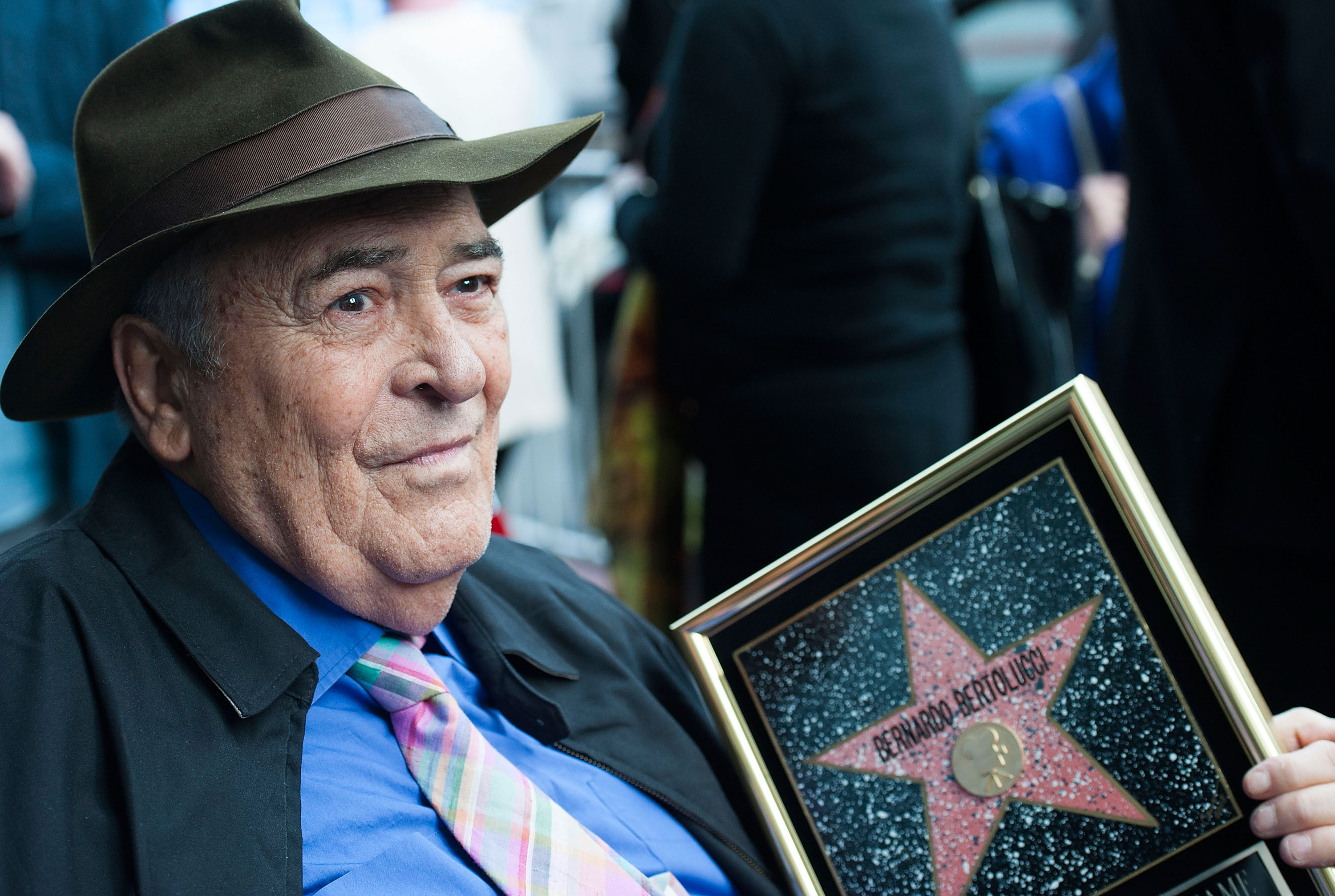 HOLLYWOOD, CA - NOVEMBER 19:  Director Bernardo Bertolucci celebrates his Star on the Hollywood Walk of Fame on November 19, 2013 in Hollywood, California.  (Photo by Valerie Macon/Getty Images)
